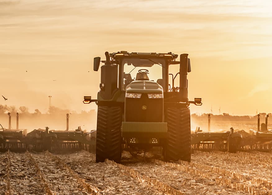 Front view of Autonomous 9RX 640 tractor with 2660VT tillage working in the field