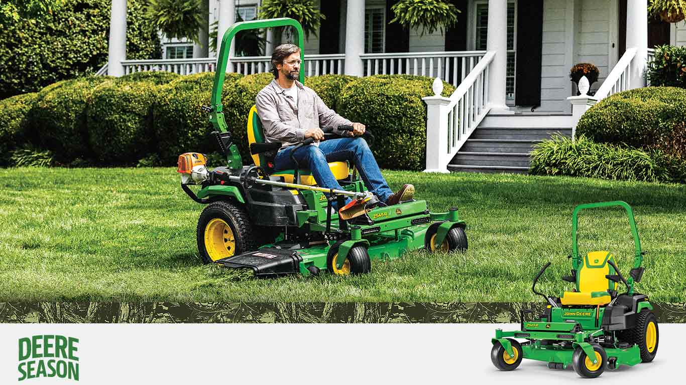 Person on a Z545 ZTrak Mower cutting grass.