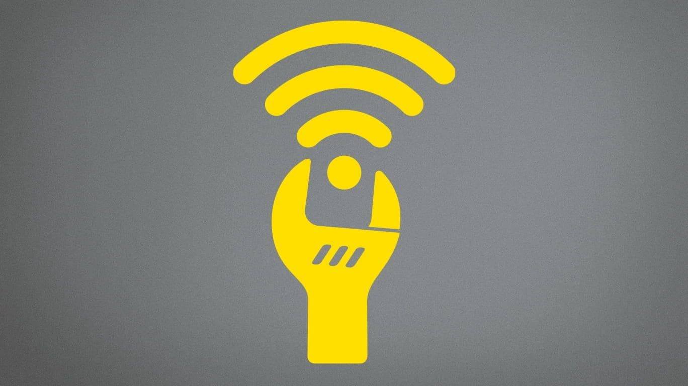 Icon of a wrench adjusting a wifi logo