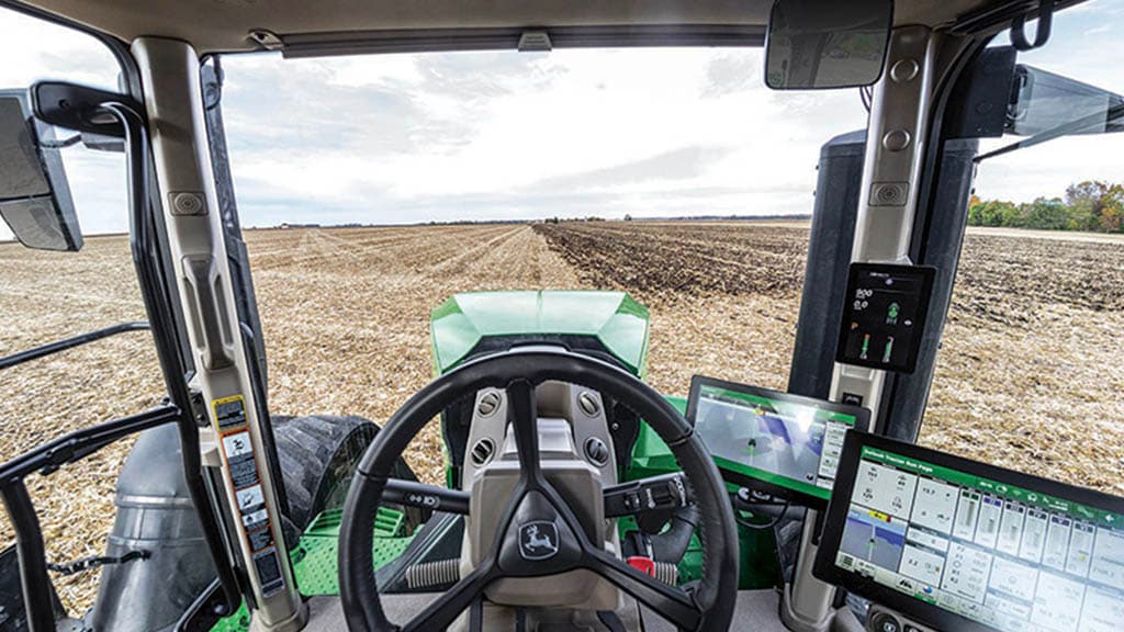 In-cab view of G5<sup>Plus</sup> CommandCenter looking on tilled land.