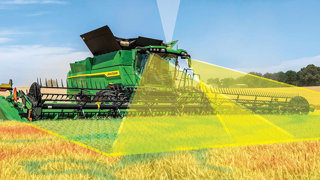 Photo of a John Deere S7 Combine harvesting wheat with a draper head. It also shows graphics that simulate the front, stereo cameras measuring crop height and volume as part of the Predictive Ground Speed Automation technology.
