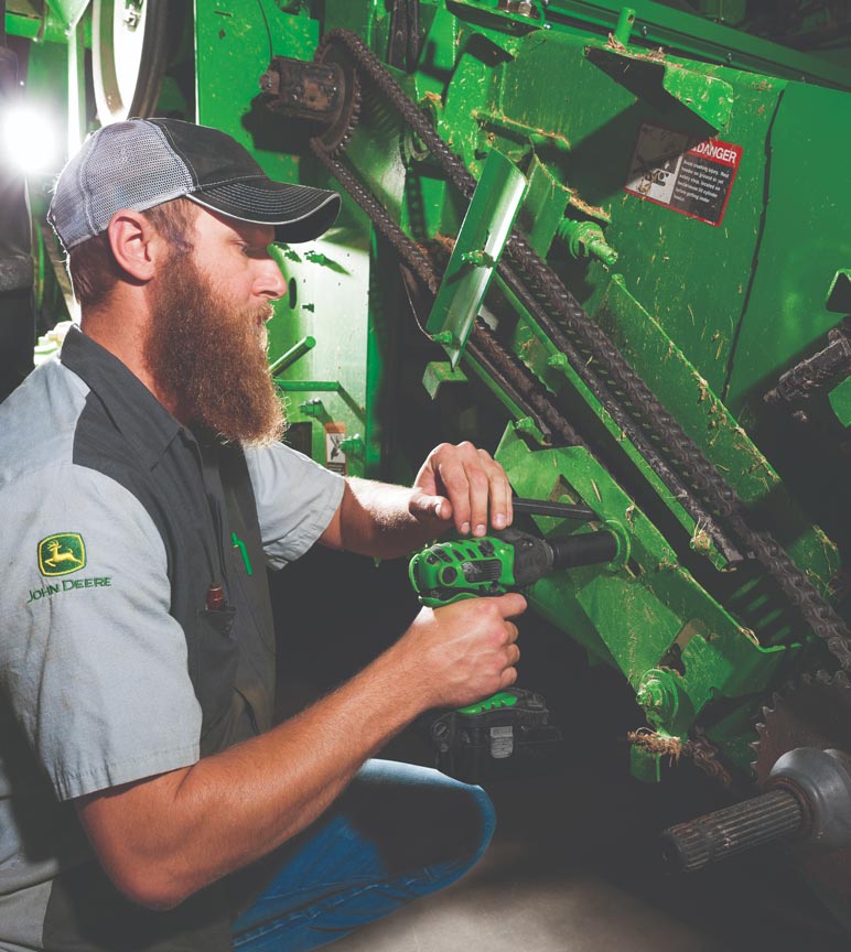 Man doing maintenance work on a machine