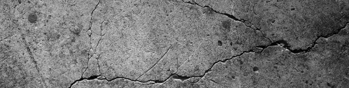 Close up of cracked concrete ground