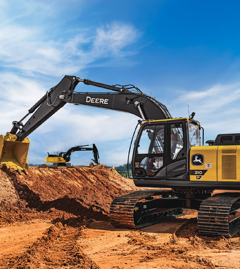 210P Excavator digging into wall of dirt