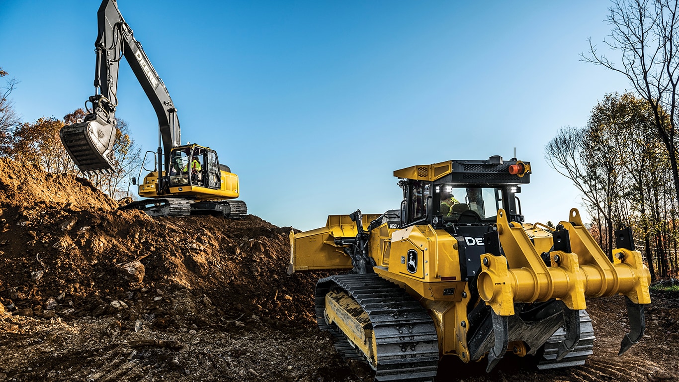 John&nbsp;Deere 950 P-Tier Dozer and excavator on the jobsite moving dirt