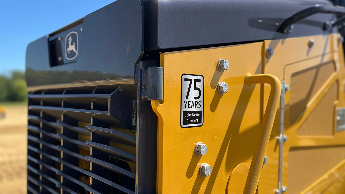 Close-up of the "75 Years John&nbsp;Deere Crawlers" machine decal