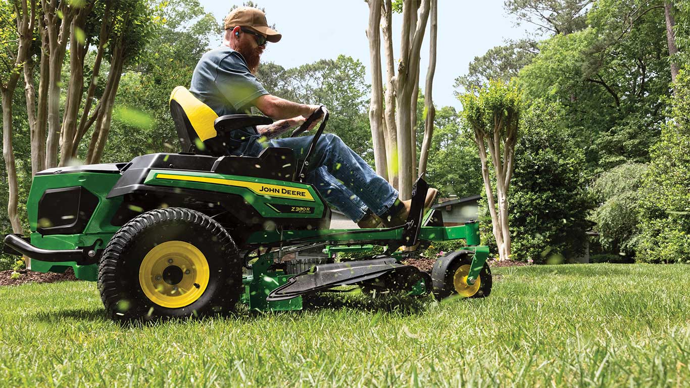 Side view of the Z380R Electric Mower cutting the lawn