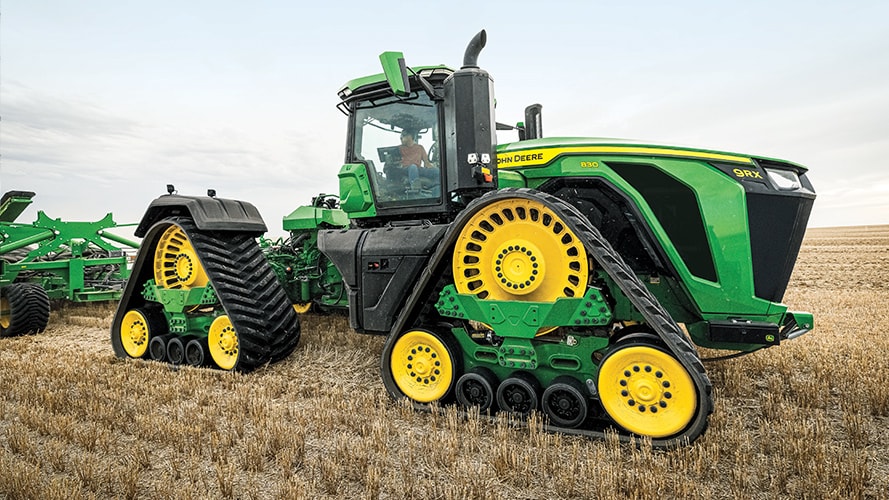 A John Deere 9RX tractor