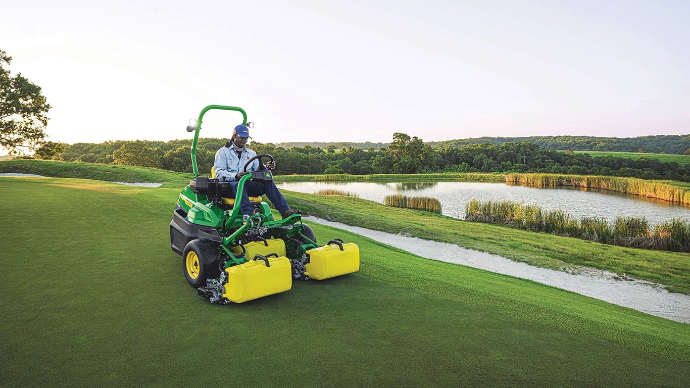 Staff mowing golf course with the 2775 E-Cut Electric Triplex Mower.