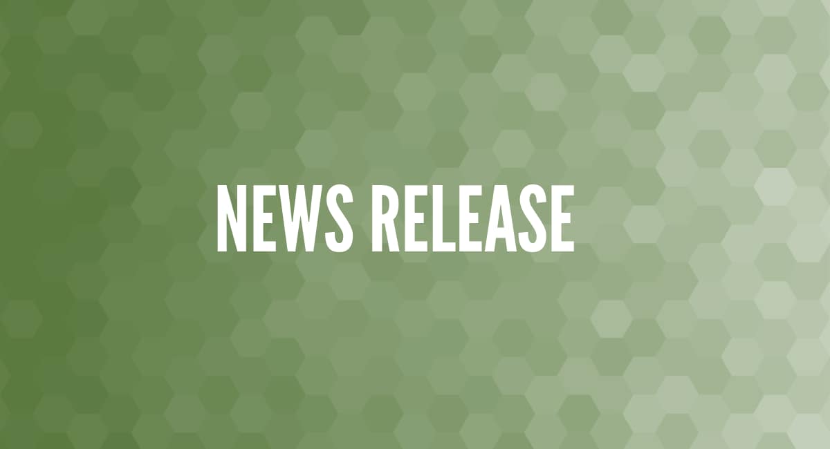 "News Release" text on a patterned green background