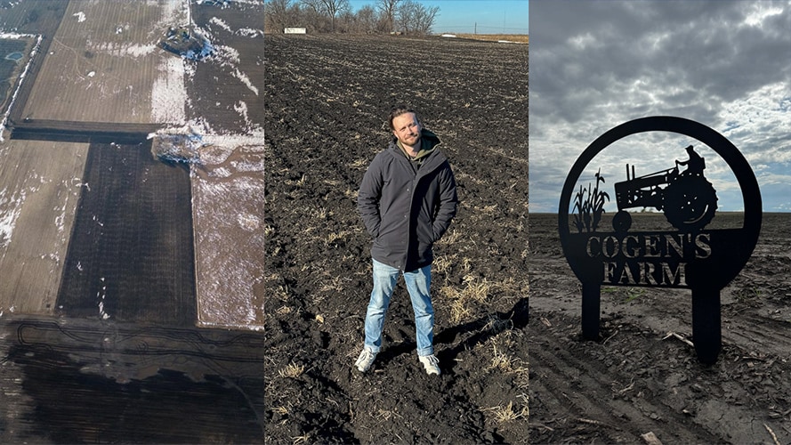 David Cogen standing in a winter farm field 