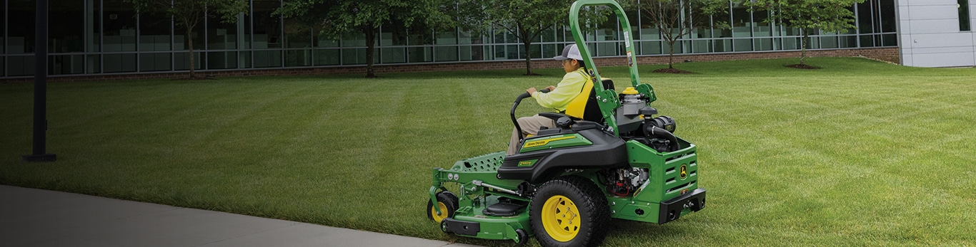 Man driving a z965m through the lawn