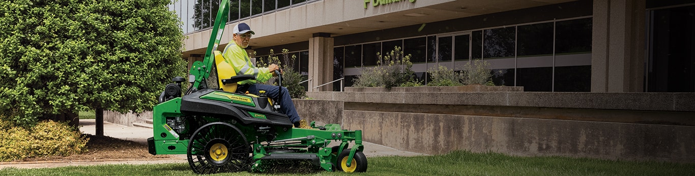 Man driving a z965r through the lawn