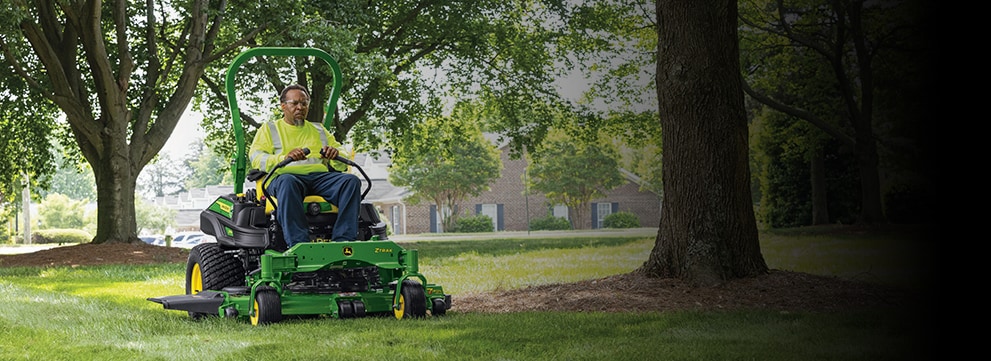 Man driving a z955r through the lawn