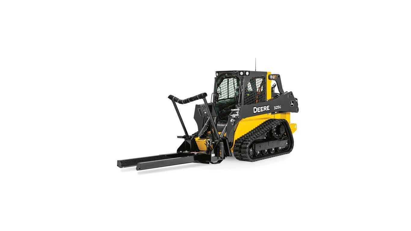 325G Compact Track Loader with NF44 Nursery Fork attachment on white background
