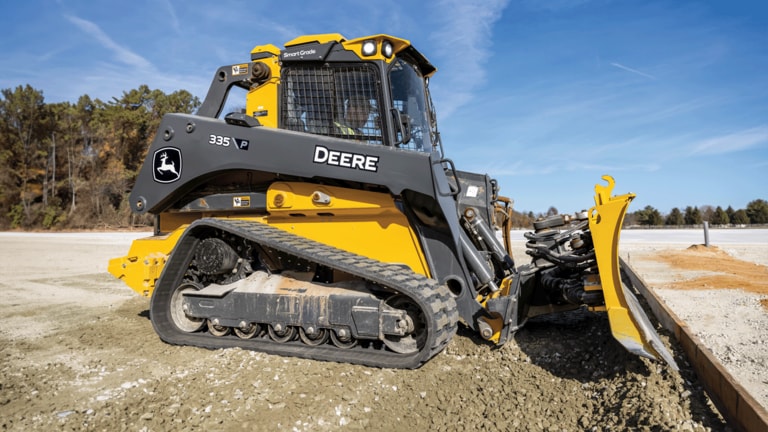 335 P-Tier compact track loader parked on job site.
