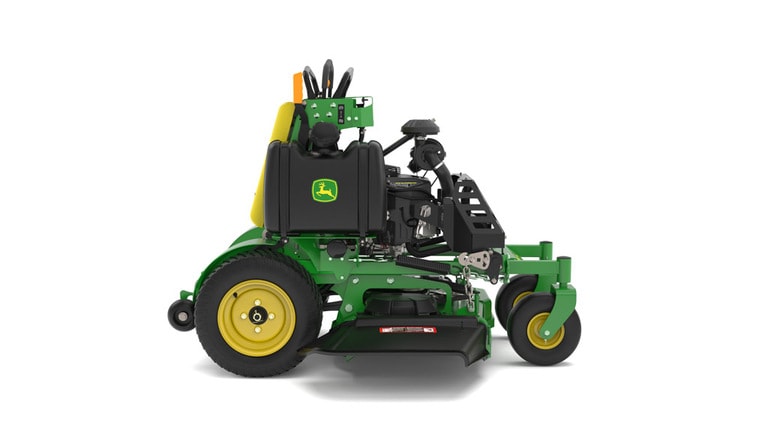 A right-facing studio shot of a green and yellow standing mower on a white background. (6th thumbnail)