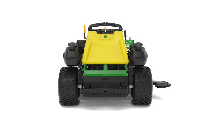 A rear-facing studio shot of a green and yellow standing mower on a white background. (4th thumbnail)