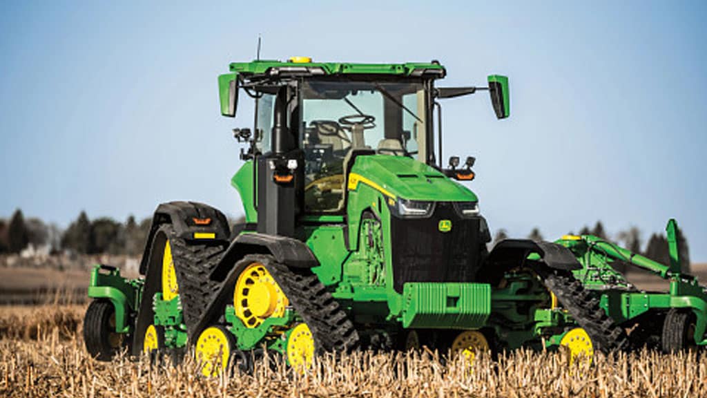 8RX Autonomous Tractor in a field doing tillage work