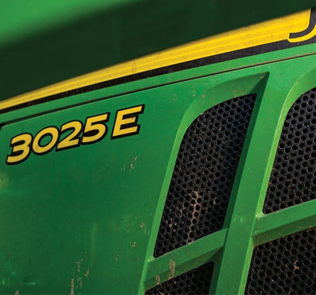 zoomed in view of 3025e logo on a tractor
