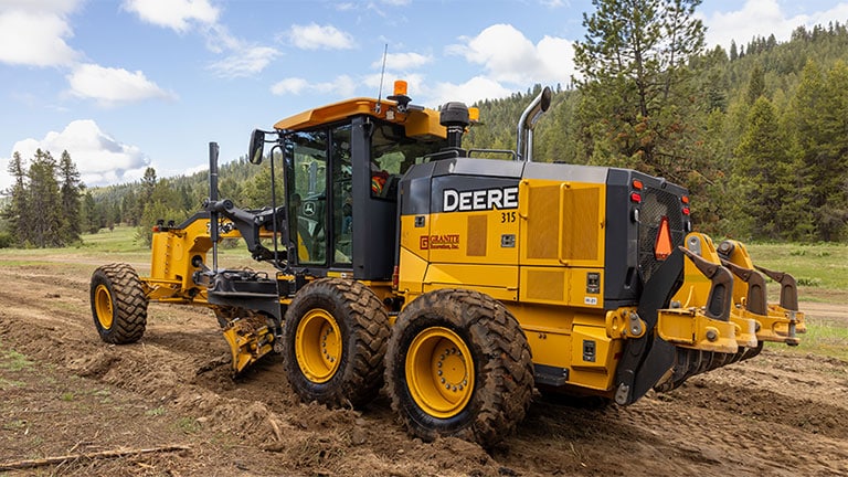 A John&nbsp;Deere 772GP-Tier Motor Grader utilizes SmartGrade technology for precise dirt-pushing.