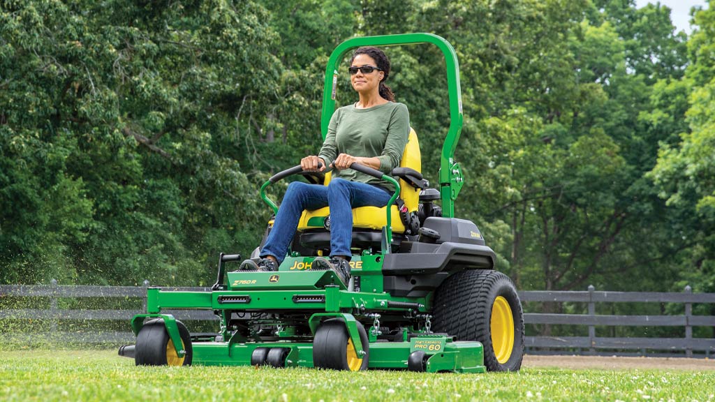 Woman cutting grass on a Z760R Zero-Turn Mower.