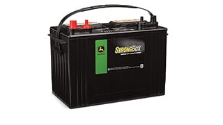 John Deere StrongBox battery with labeled front panel and top terminals.