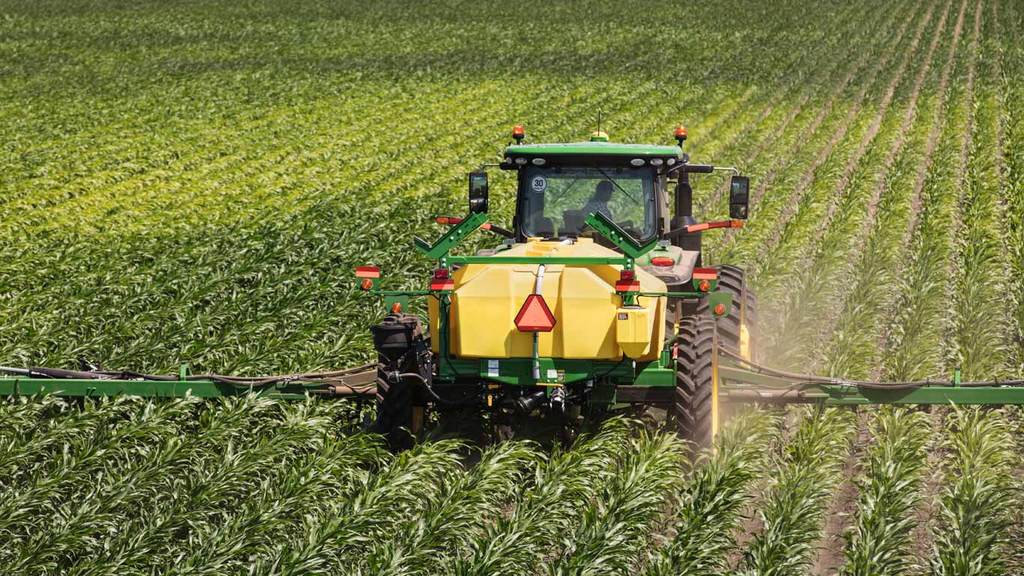 Used Equipment Sprayers working in field