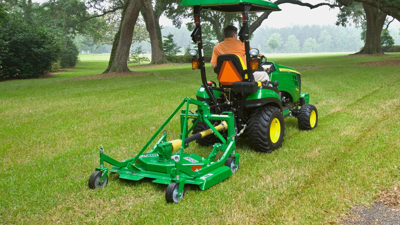 field image of Frontier™ GM10e grooming mower attached to a tractor