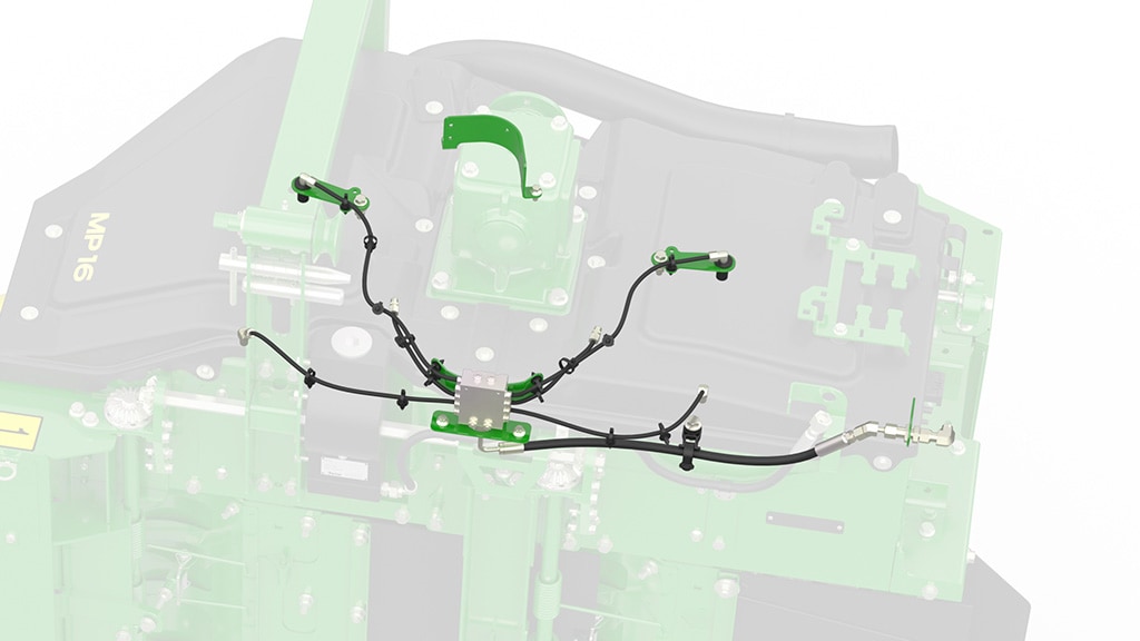A schematic – on a ghosted photo – showing the auto greasing system on a C770 Series Cotton Harvester