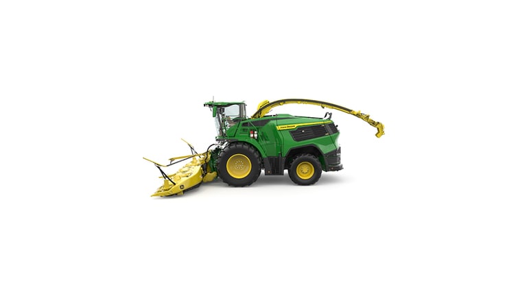 A left-facing green F9 500 self-propelled forage harvester with a yellow header on a white background. (6th thumbnail)