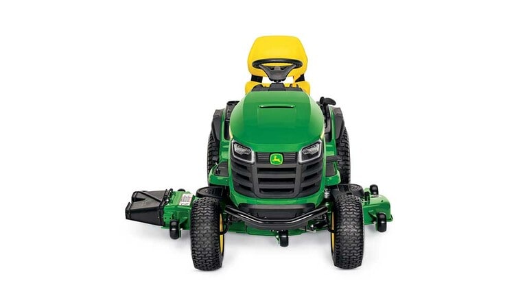 A forward-facing green riding mower with a yellow seat and green mowing deck on a white background. (3rd thumbnail)