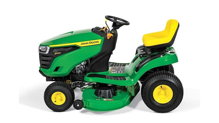 A left-facing green riding mower with a yellow seat and green mowing deck on a white background. (3rd thumbnail)