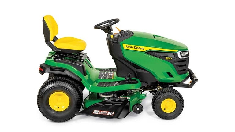 A right-facing green riding mower with a yellow seat and green mowing deck on a white background. (3rd thumbnail)