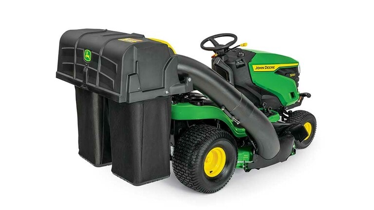 A rear-right-facing green riding mower with a bagging attachment and green 42" mowing deck on a white background. (5th thumbnail)