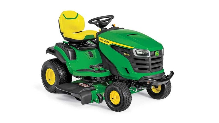 A front-right-facing green riding mower with a yellow seat and green 42" mowing deck on a white background. (5th thumbnail)