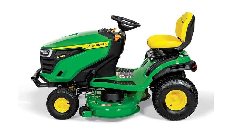 A left-facing green riding mower with a yellow seat and green 42" mowing deck on a white background. (4th thumbnail)