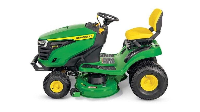 A left-facing green riding mower with a yellow seat and green 42" mowing deck on a white background. (3rd thumbnail)