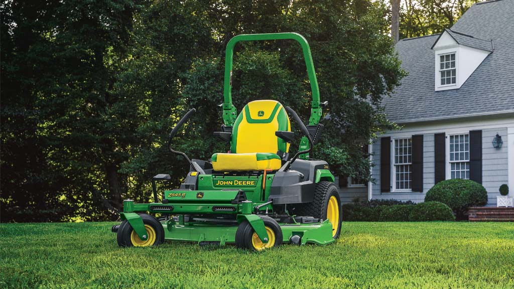 z545r ride-on lawnmower on a neatly trimmed lawn in front of a house