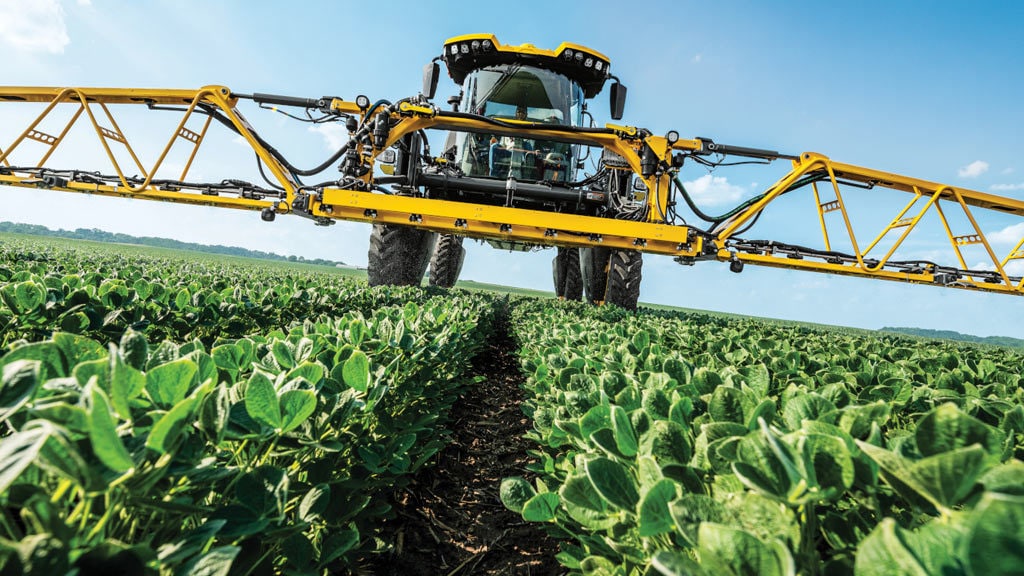 Used Equipment Sprayers working in field
