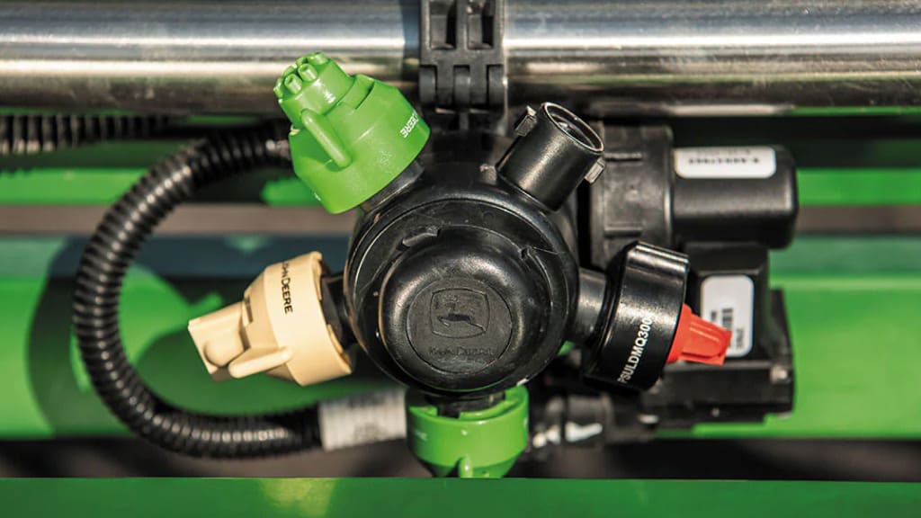 Close-up photograph of an Individual Nozzle Control Heavy Duty Precision Upgrade on a sprayer.