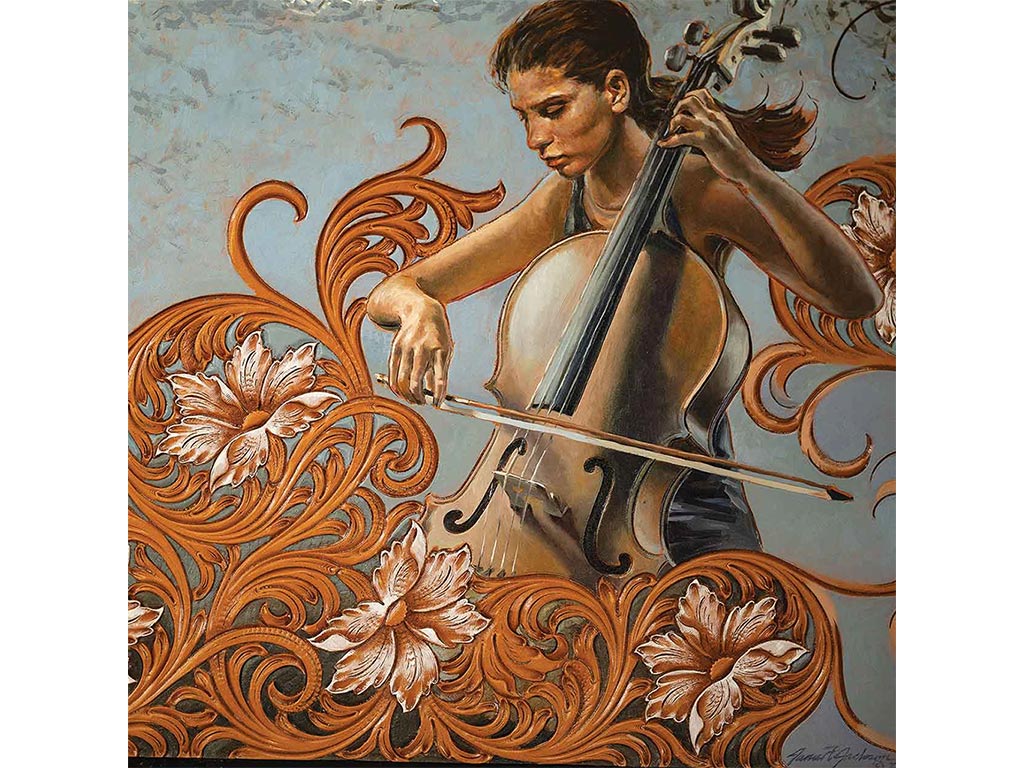 an elaborate leather carving of a person playing the cello surrounded by swirls of flowers and leaves