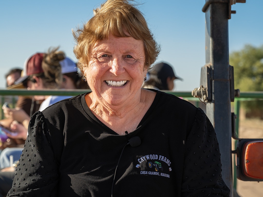 Nancy Caywood wearing a black Caywood Farms shirt and smiling