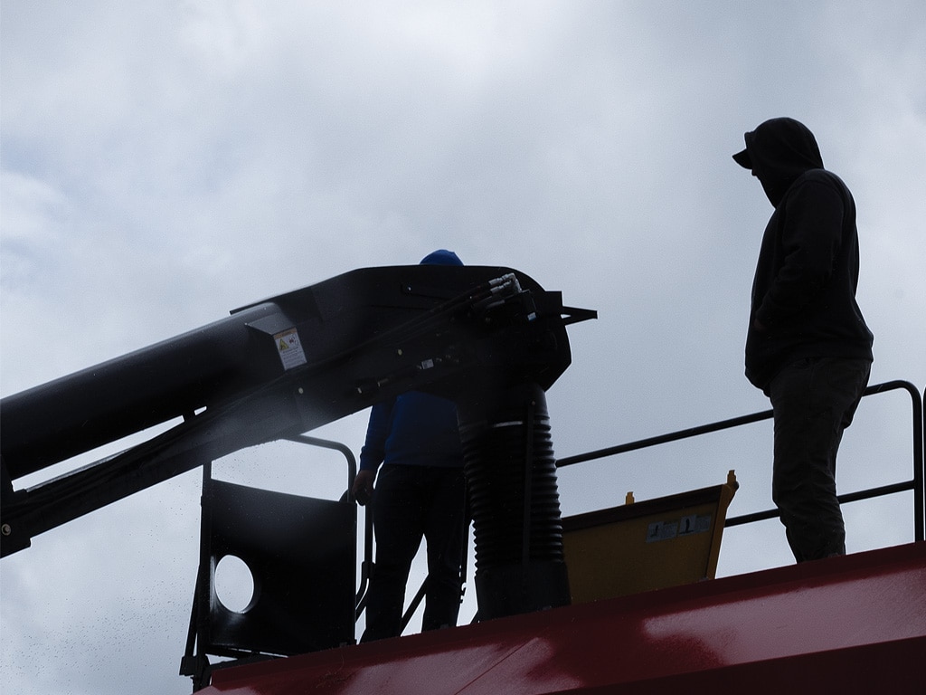 person on top of a metal tower