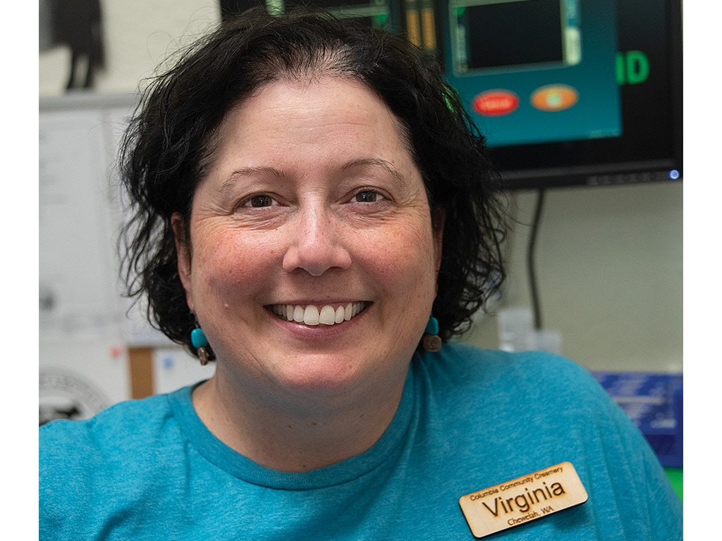 a Columbia Community Creamery employee smiling