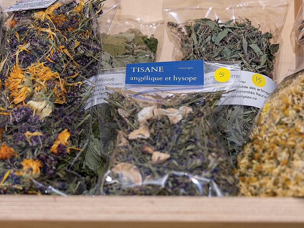 an assortment of vegetables in plastic bags