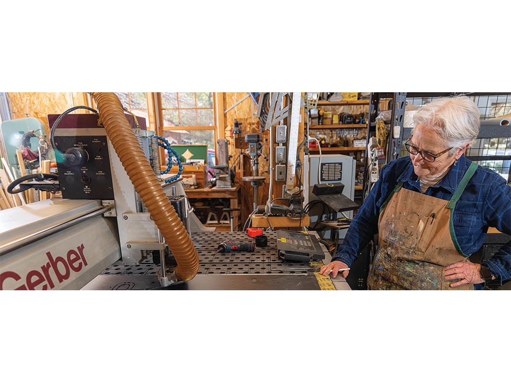 Noella Cotnam at a workbench