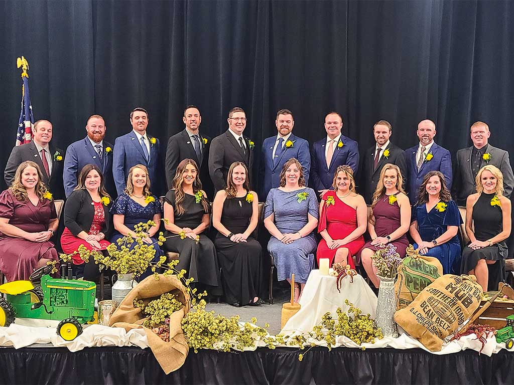 the winning 10 couples for NOYF lined up in formal attire on a stage