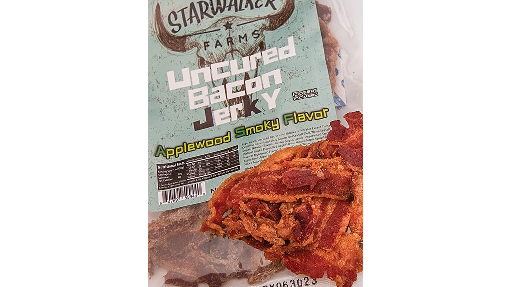 bacon jerky and package labeled Uncured Back Jerky Applewood Smoky Flavor