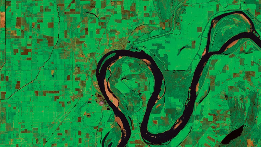 aerial image from maps showing green spots and water flows